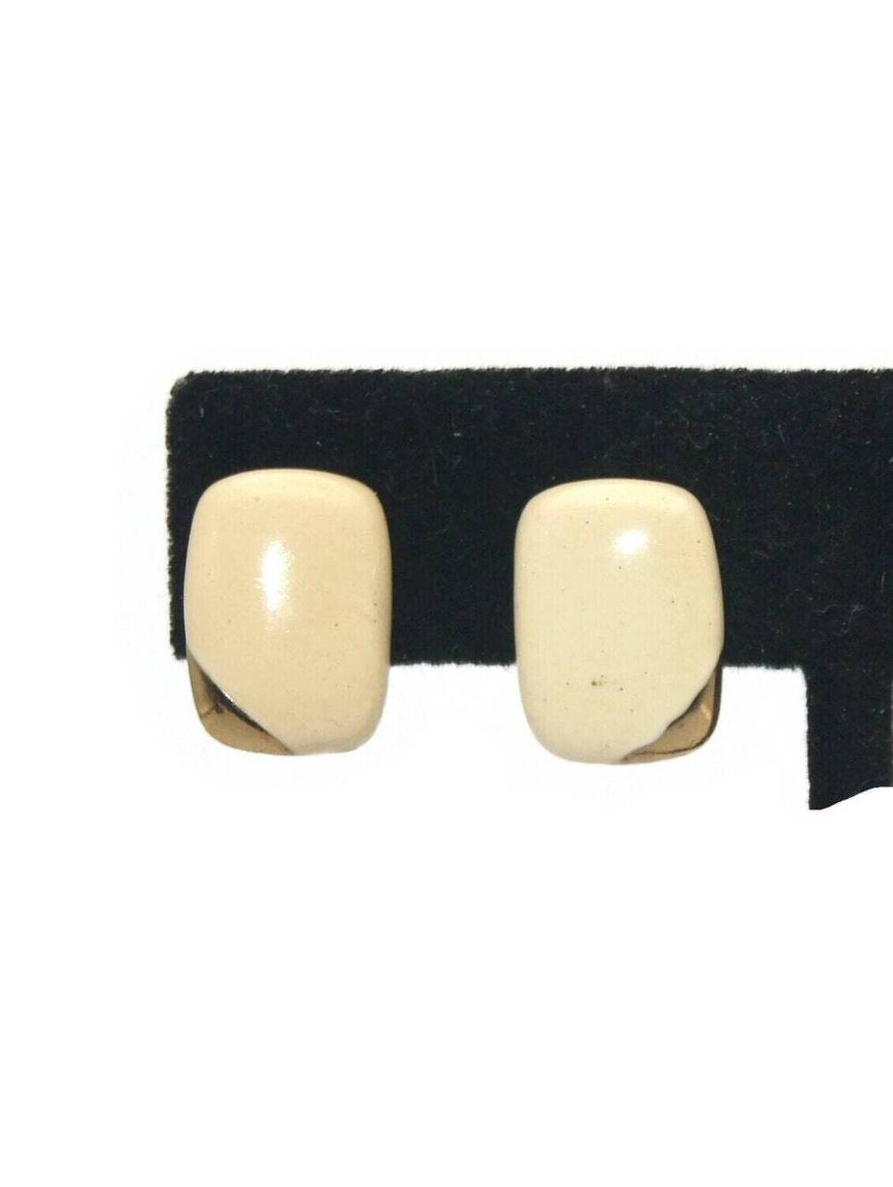 Small Vintage Gold Tone and Off White Enamel Clip on Earrings.